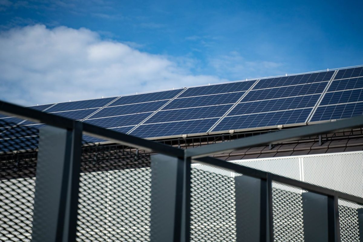 Rooftop solar panels feeding DC power to a home inverter system