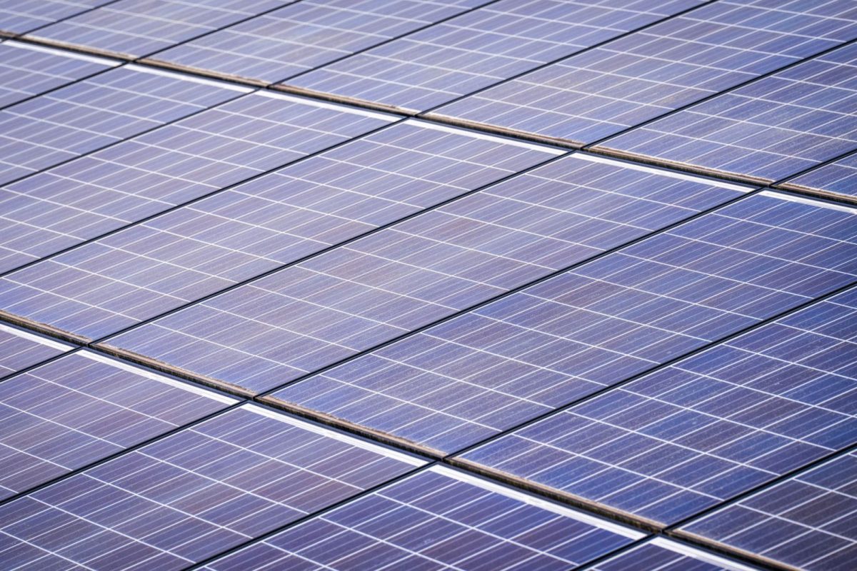 Close-up of a monocrystalline solar panel surface and cells