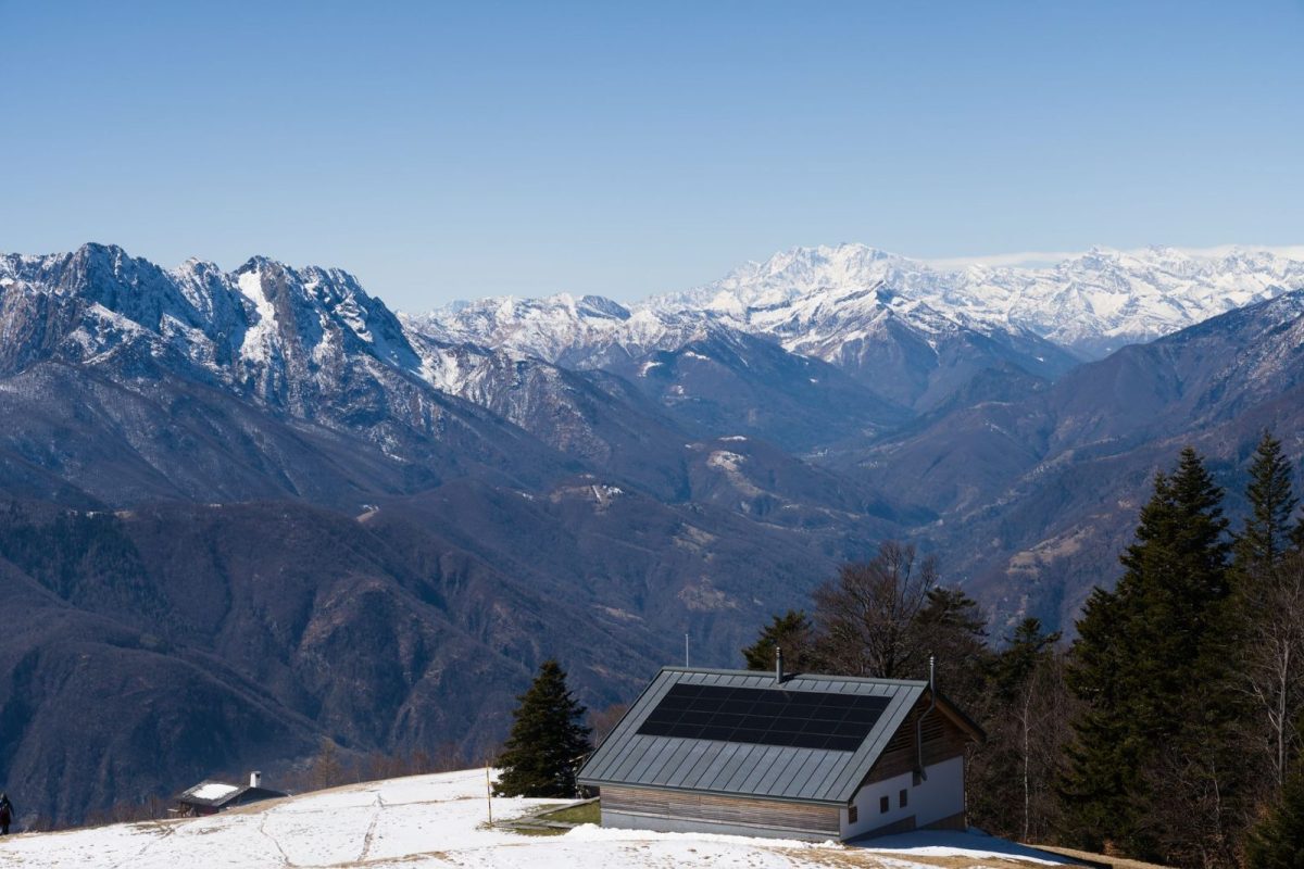 Snow and frost on rooftop solar panels reducing winter output