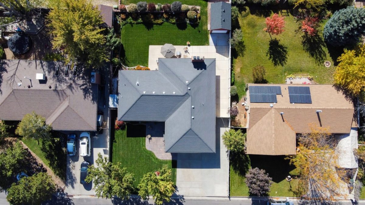 Home rooftop with solar panels protected by product and power warranties