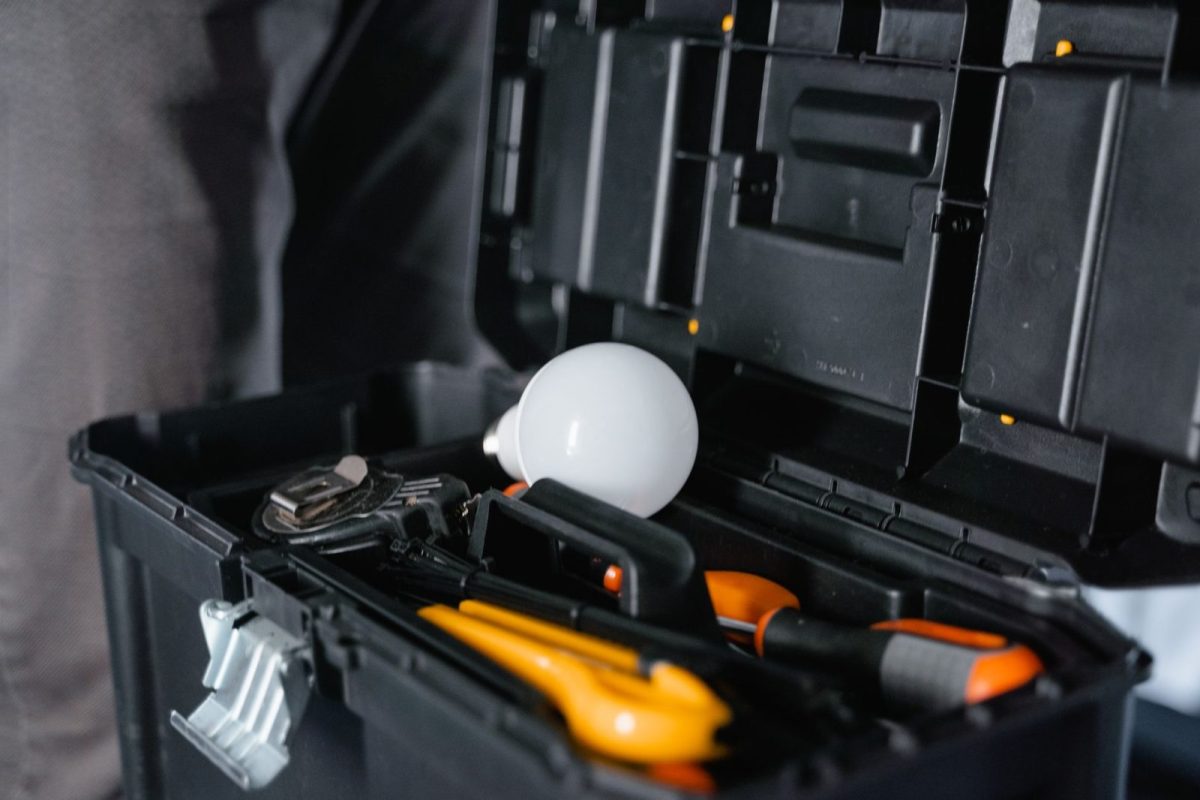 Licensed electrician working on a distribution board