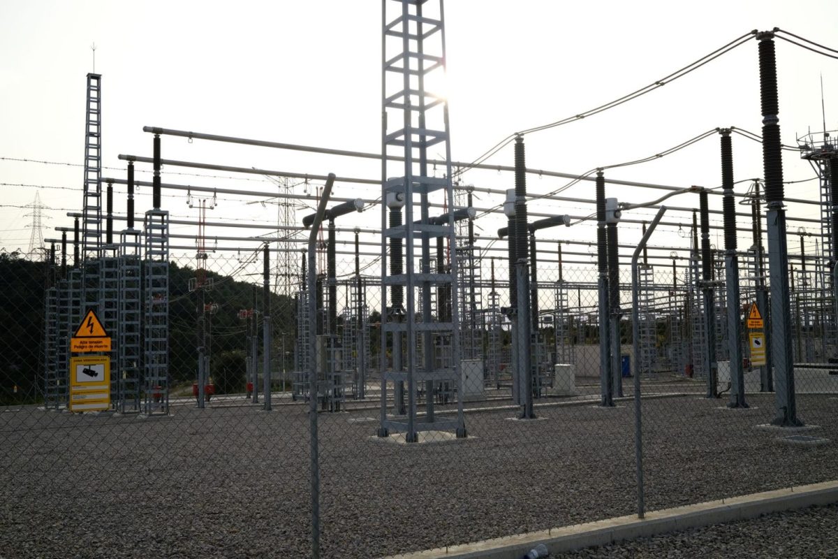 Home electrical distribution board with rows of circuit breakers and switches